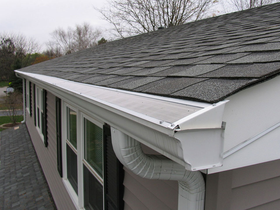 http://www.gutterdome.com/wp-content/uploads/2016/12/GutterDome-GD45-Installed-on-Comp-Shingle-Roof-End-Cap-Side-View.jpg